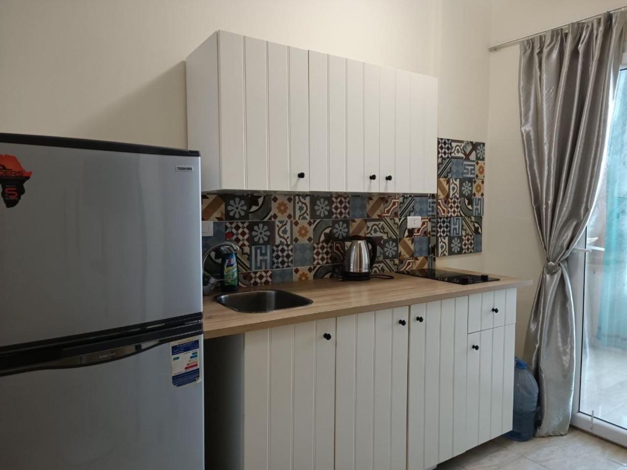 Cozy Little Near Kite Station. Appartement *